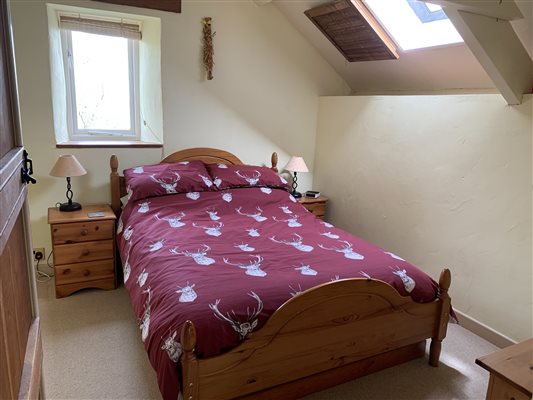 Double bedroom with view down the valley